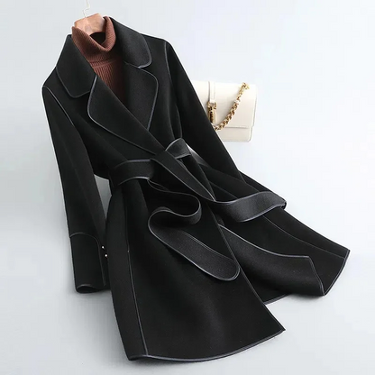 https://cdn.shopify.com/s/files/1/0548/7604/5509/files/Mariana_Belted_Wrap_Coat_black.png?v=1738694050