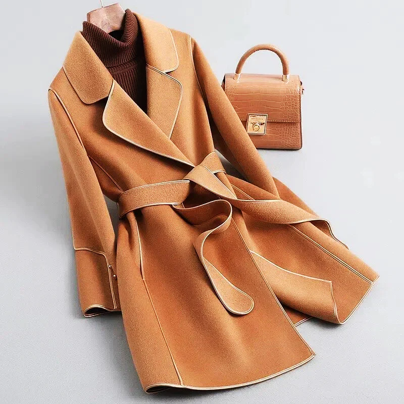 https://cdn.shopify.com/s/files/1/0548/7604/5509/files/Mariana_Belted_Wrap_Coat_sand.png?v=1738694050